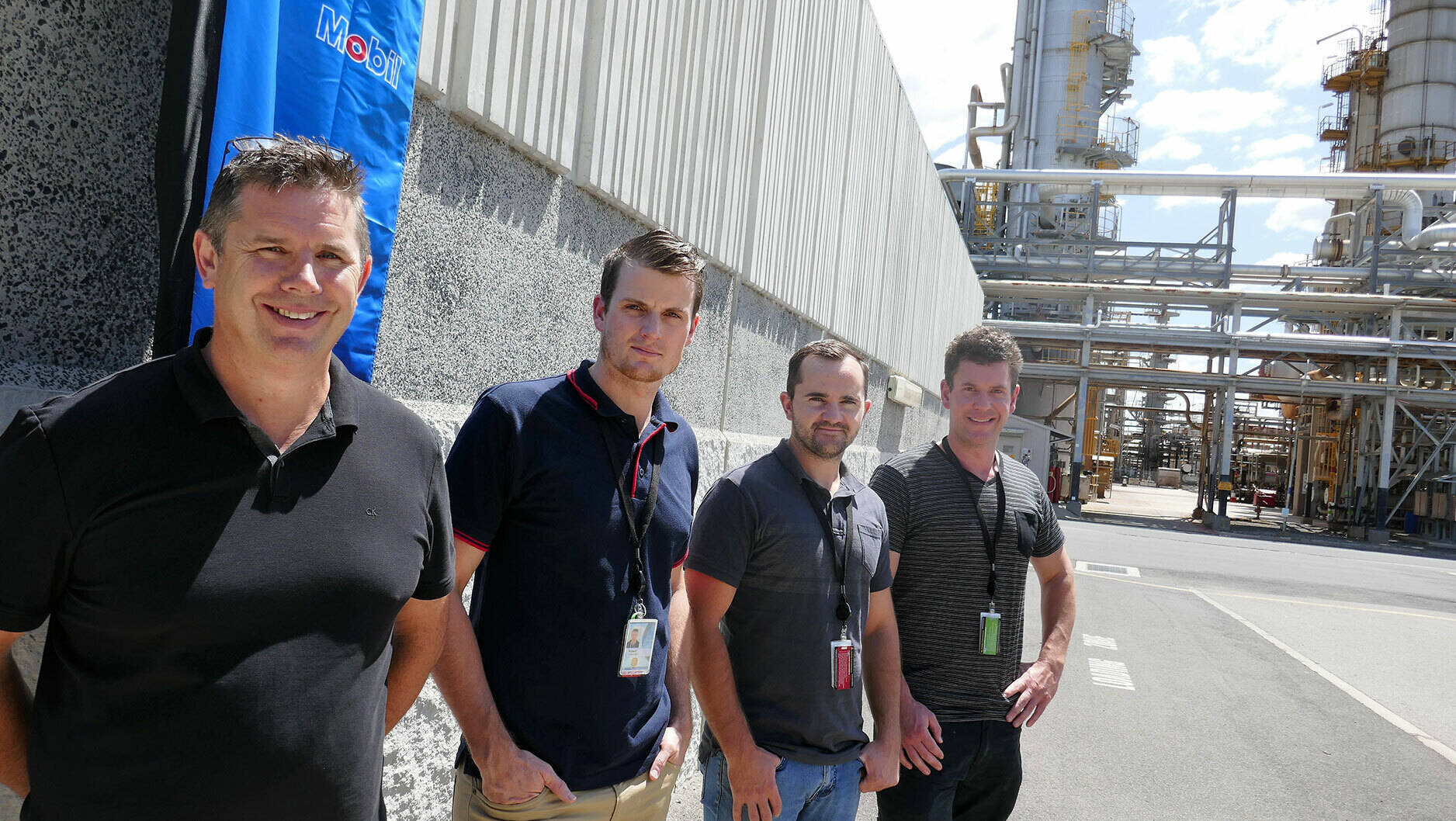 Image Photo New recruits Robert Creasey, Michael Noden and James Dearnaley with Altona Refinery Training Coordinator Mark Duke (pictured left).
