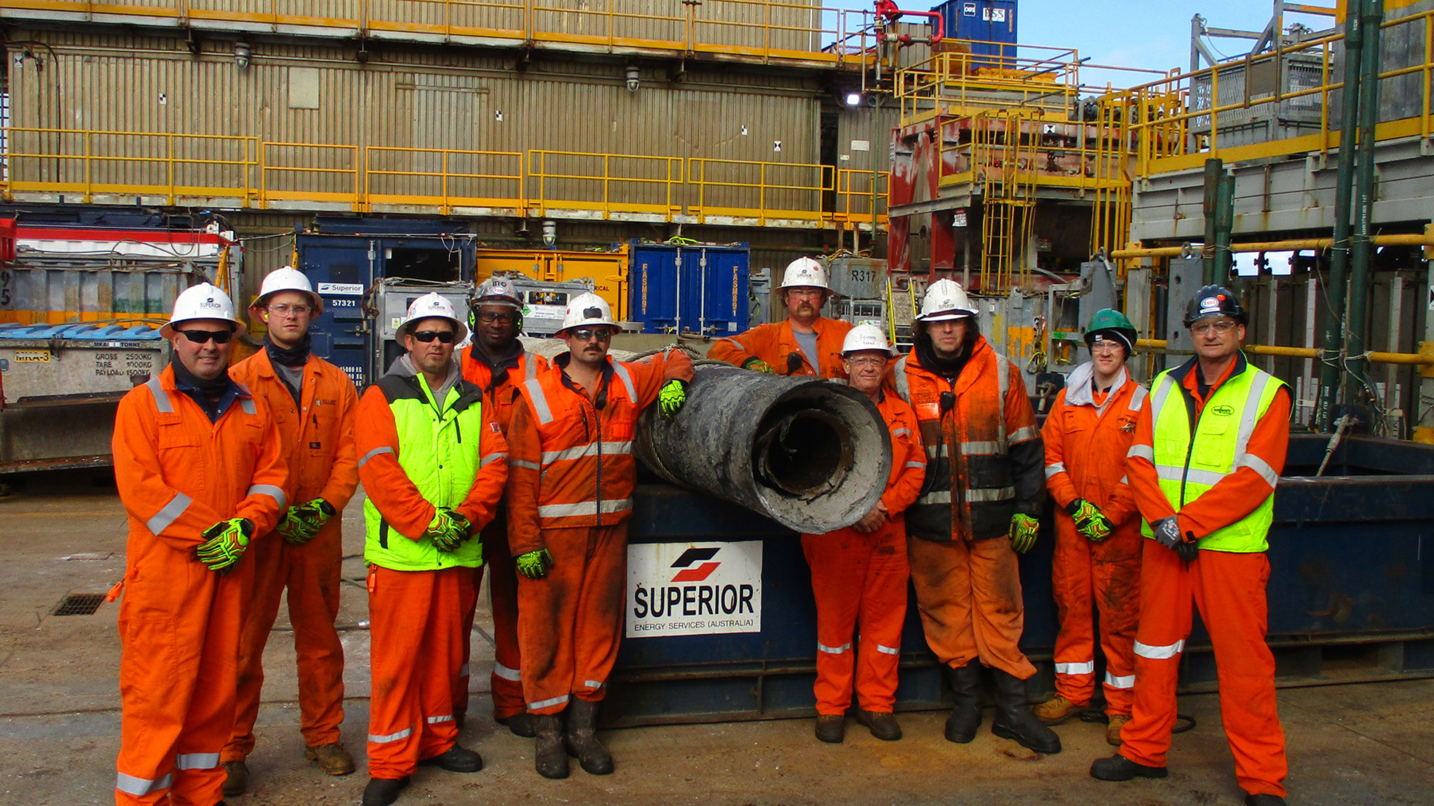 Image Some of the team with the final conductor piece removed from Mackerel using Rig 22