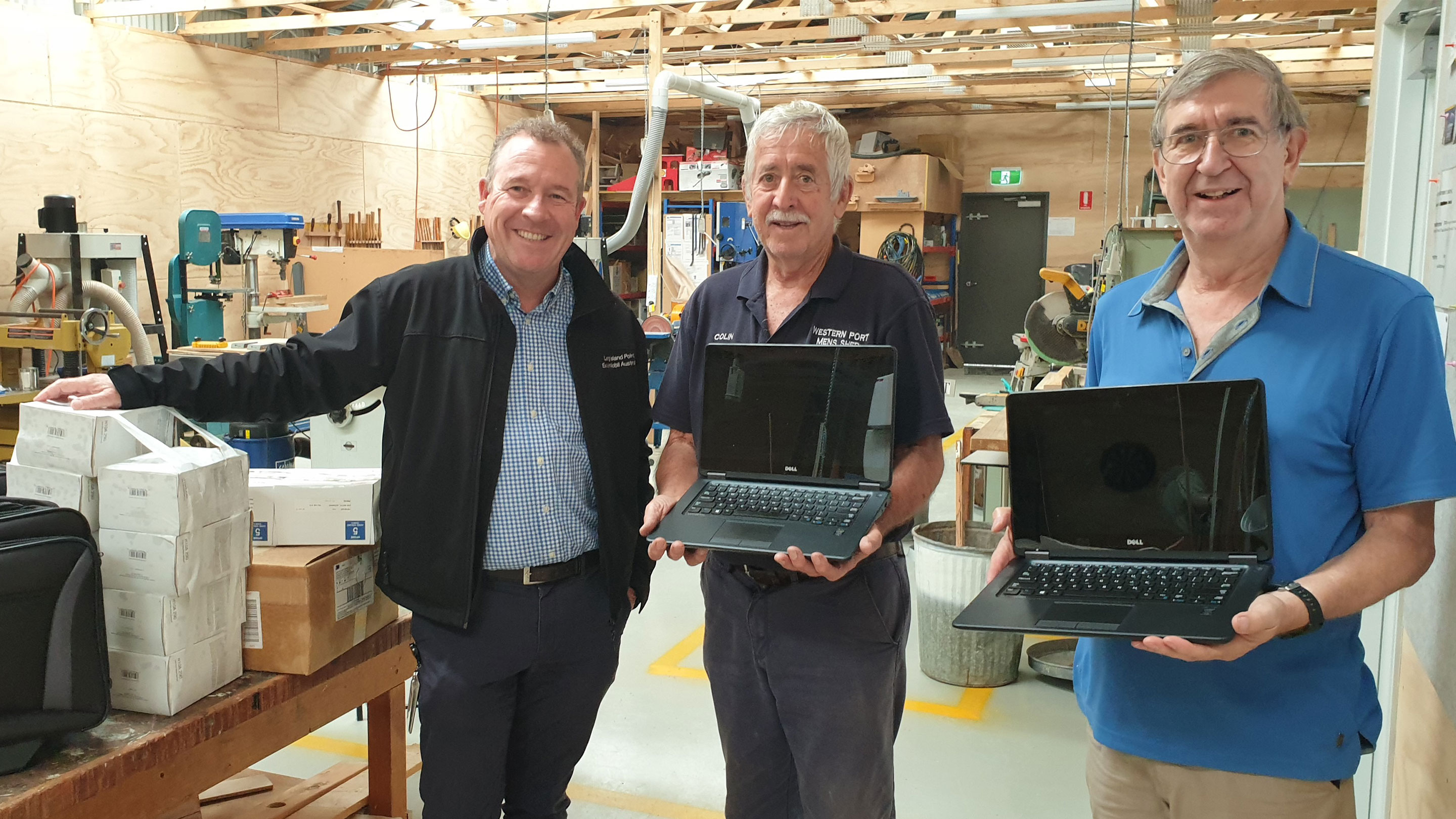 Long Island Point Manager, David McCord (left) delivered some Esso laptops to the Western Port Men's Shed.