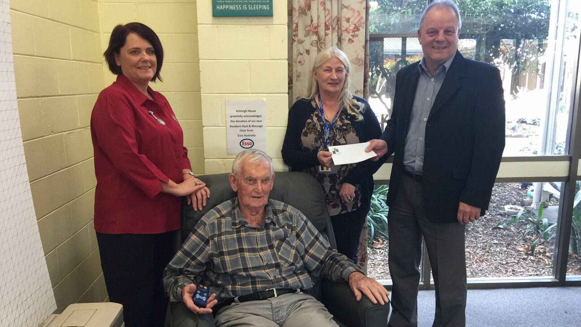 Image Photo — Pictured are Personal Care Attendant Chelsey Packham, resident Phil Gogoll, Sale Elderly Citizens Village Chairperson Ann Ferguson and Longford Plants Manager David Anderson.