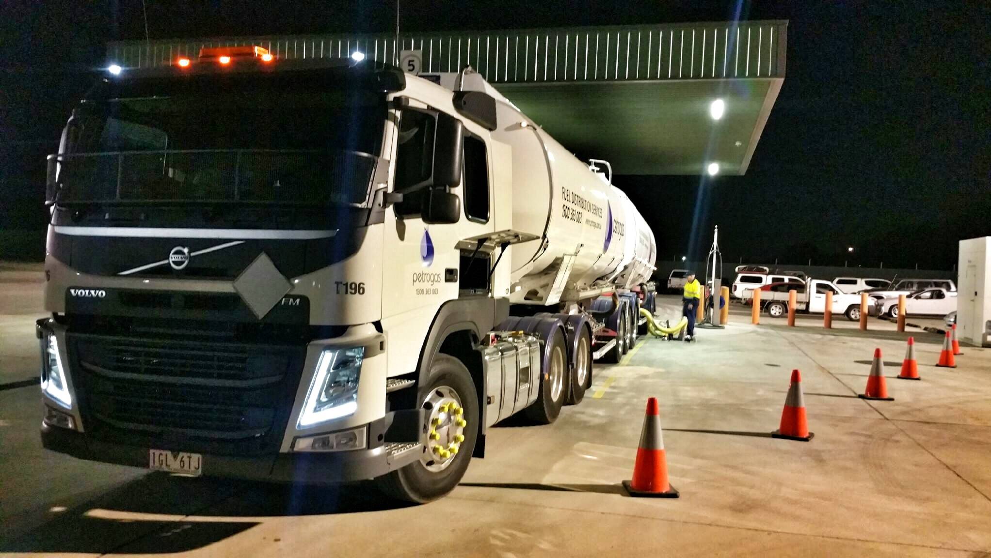 Image Photo— A Mobil fleet hauler, Petrogas, delivers diesel to a customer in Adelaide. “We ask a great deal of our drivers. Not only do they need to drive safely, but they have to load and unload their fuel cargos safely.”