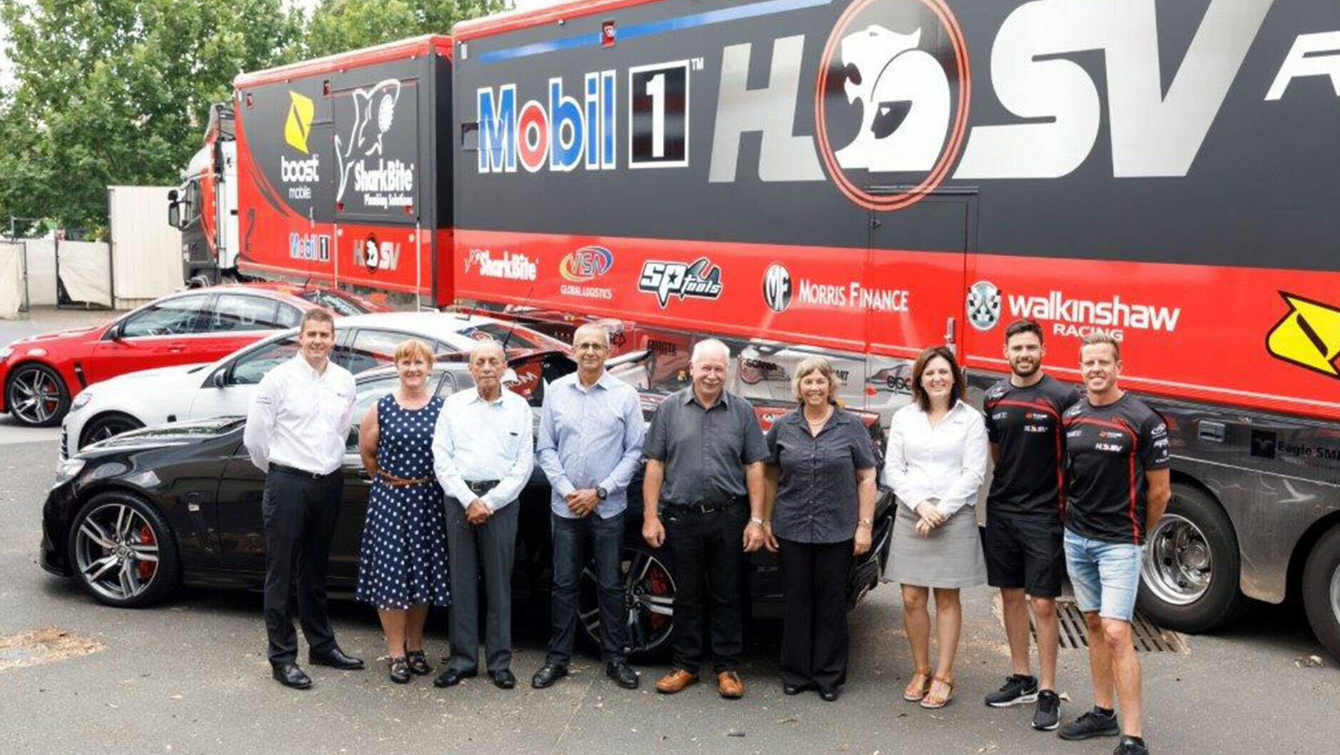 Image PhotoAsk for Mobilgrand prize winners Steve Williams and Neville Roesler (centre) are joined by ExxonMobil's Colin Smith and Christie Torwick EM and Mobil 1 HSV drivers Scott Pye and James Courtney.