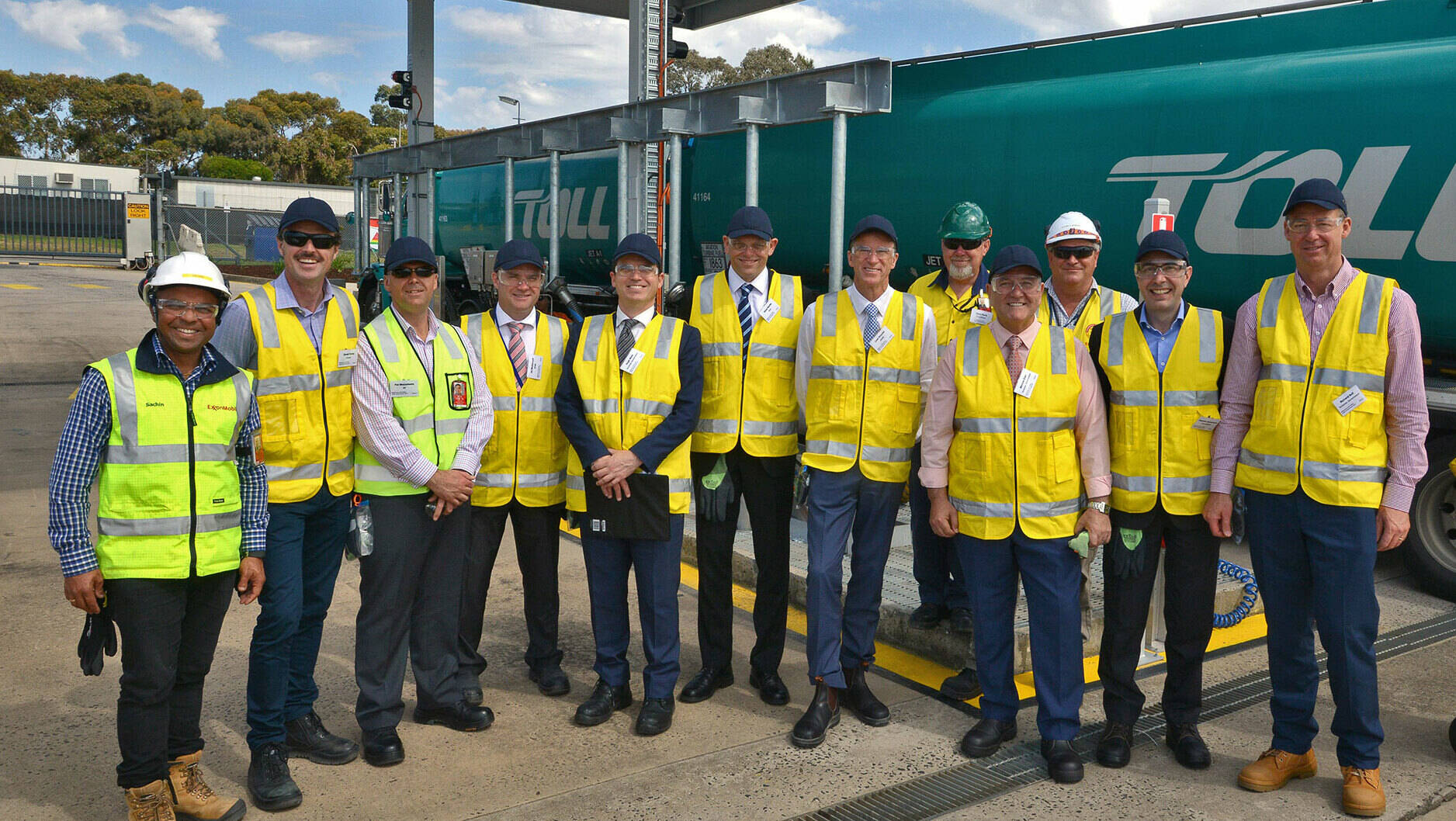 Image Photo— Industry stakeholders with Victorian Tourism Minister John Eren (pictured fourth from right) at the new truck unloading facility.