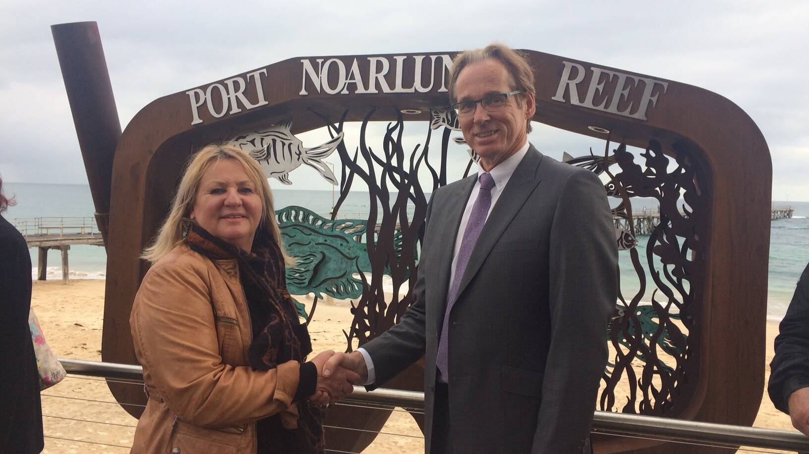 Image Photo Jeanette Howell, Chairwoman, Port Noarlunga Business  Tourism Association and ExxonMobils Mark Davey celebrate the launch of the public art project.
