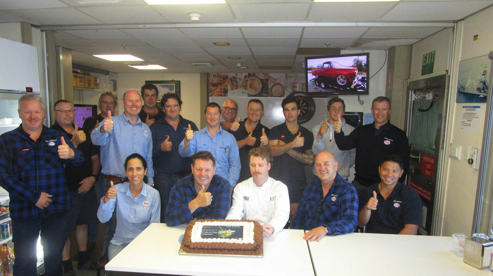 Image Photo— Staff on Barracouta platform celebrate the 50 year anniversary.